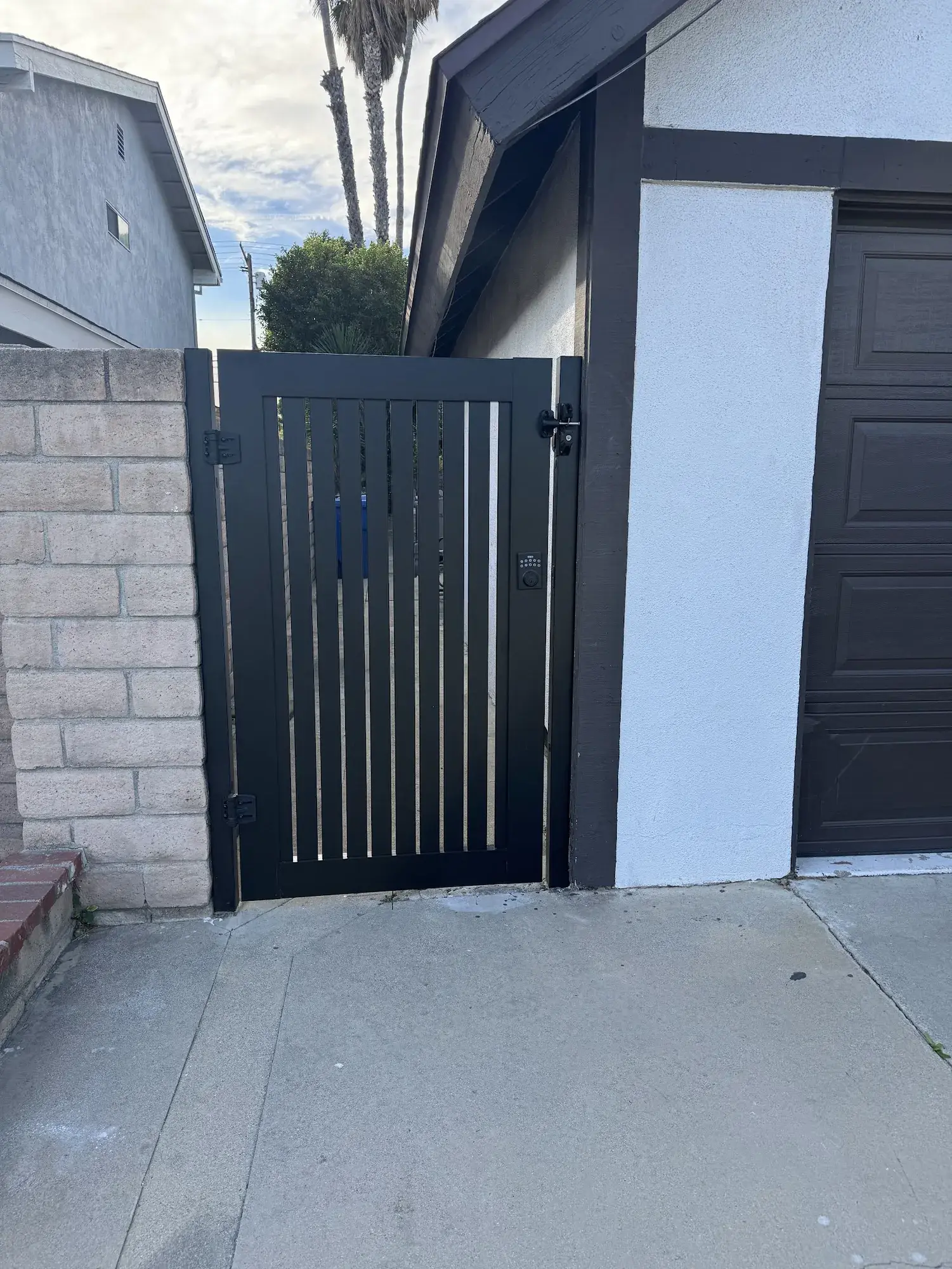 Black aluminum vertical semi-privacy gate in Northridge, CA — photo 2 of 3