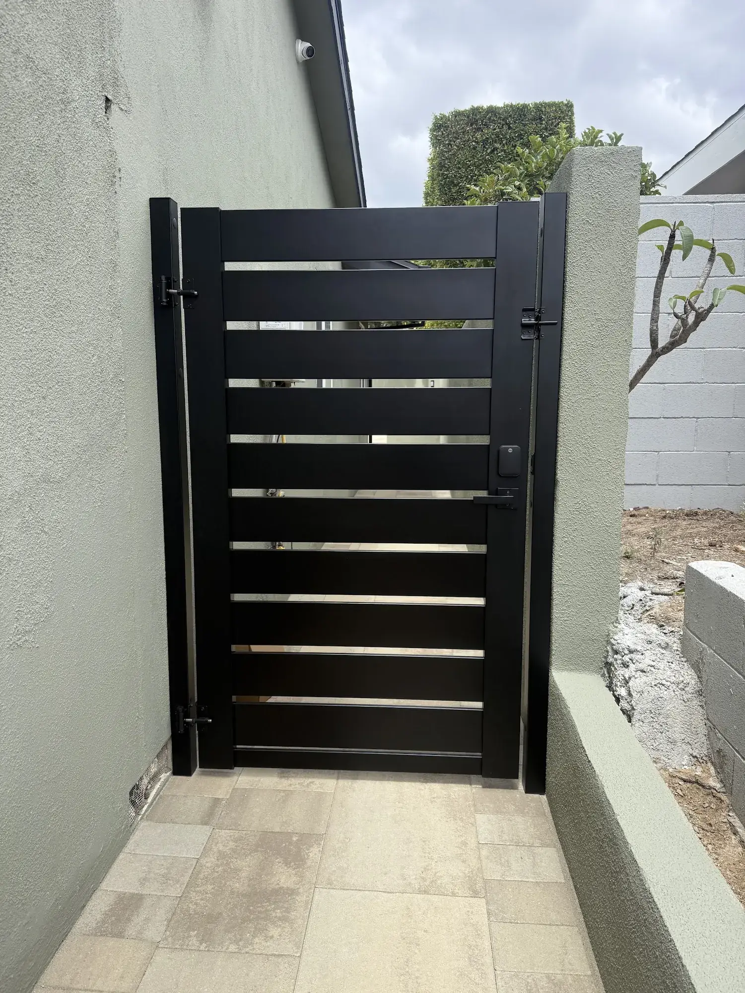 Black aluminum semi-privacy gate in Los Angeles, CA — photo 2 of 2