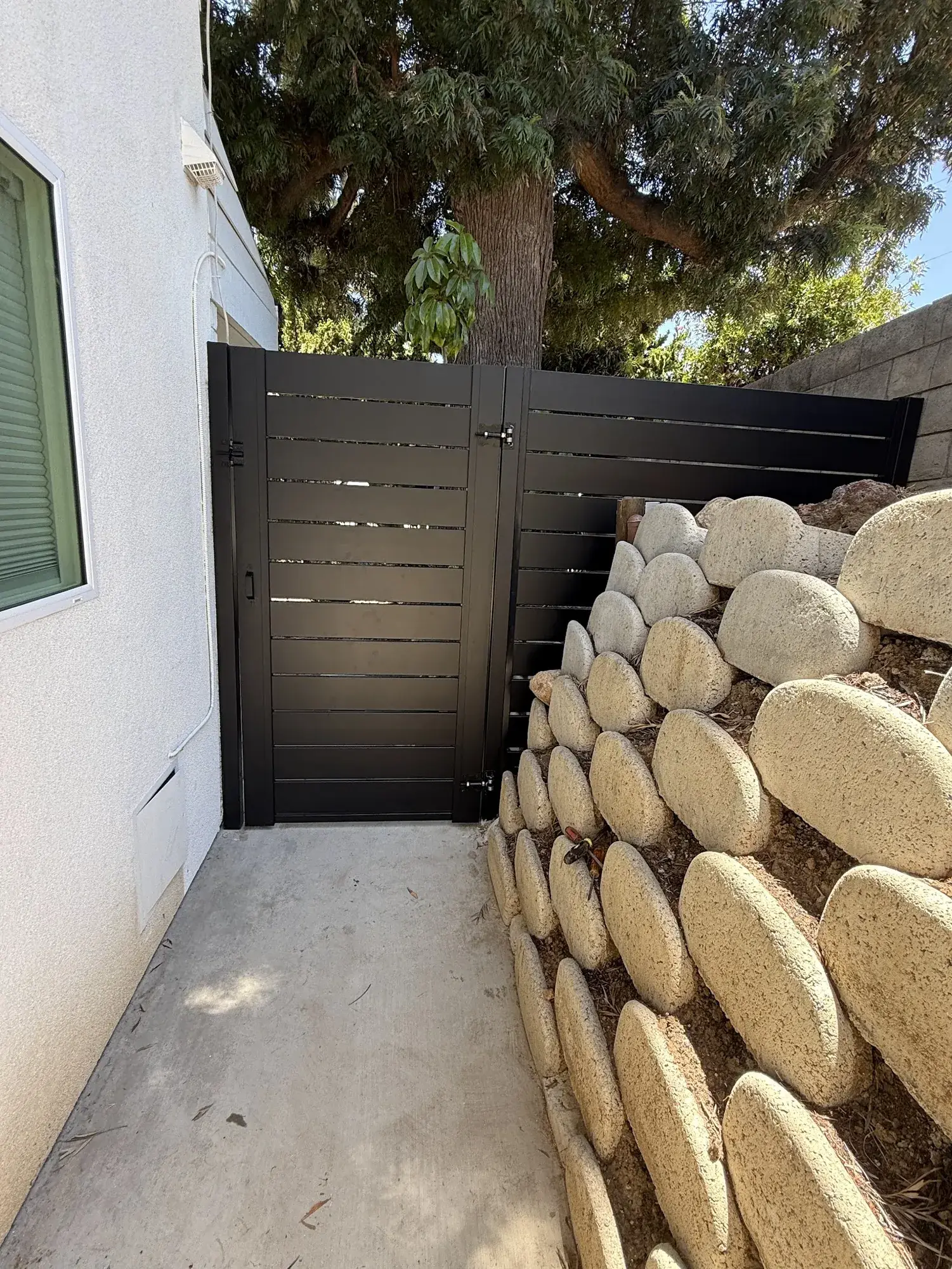 Black aluminum semi-privacy fencing & gates in La Habra, CA — photo 3 of 6