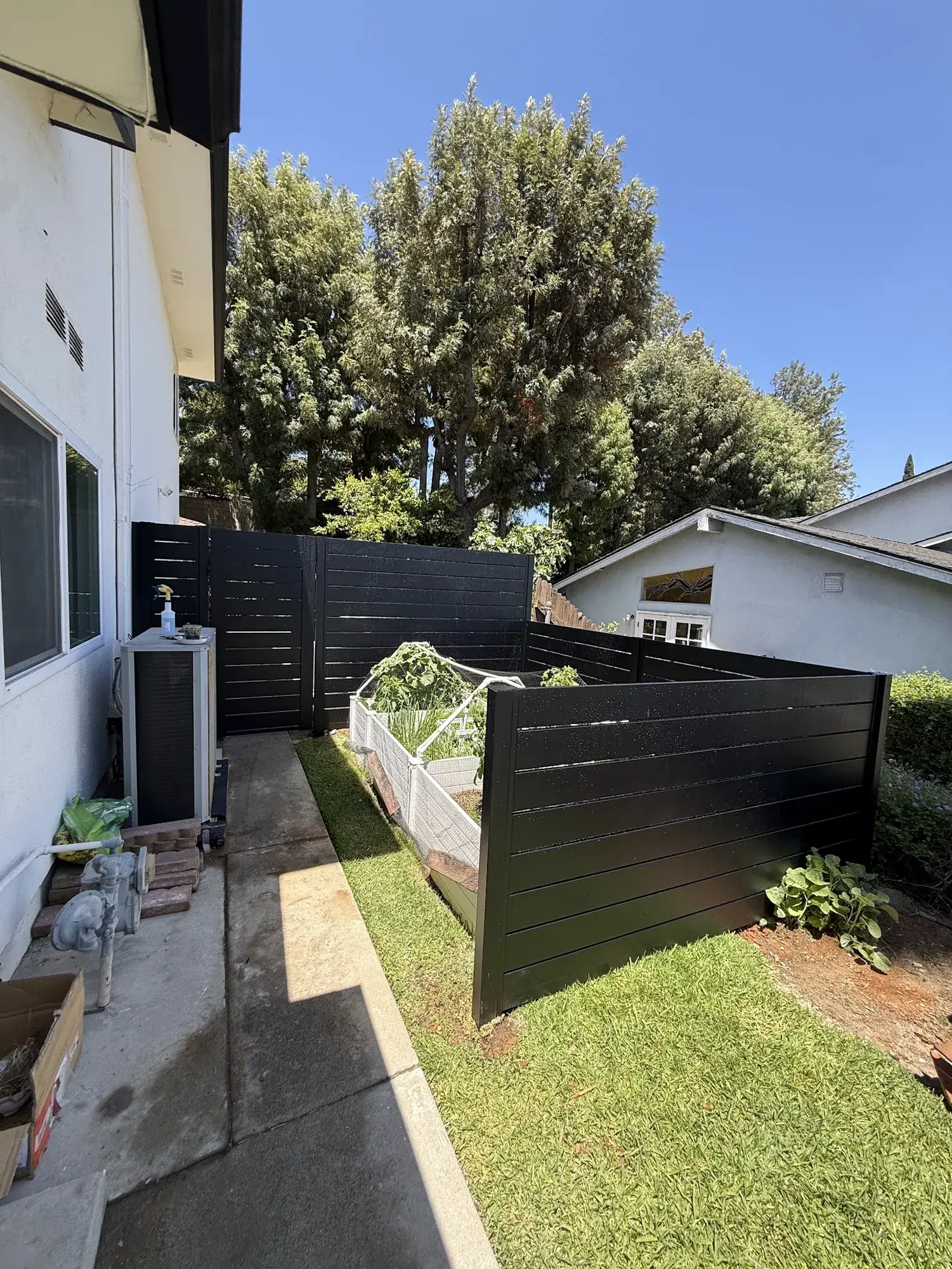 Black aluminum semi-privacy fencing & gates in La Habra, CA — photo 5 of 6
